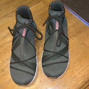 Olive green Puma sneakers with rose gold accents